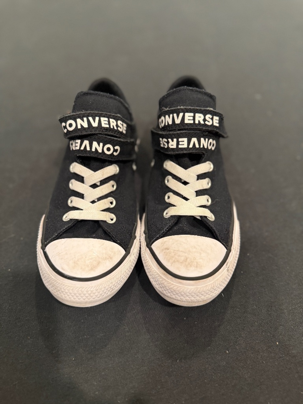 Kids (Junior) black Converse All Stars with criss crossed velcro